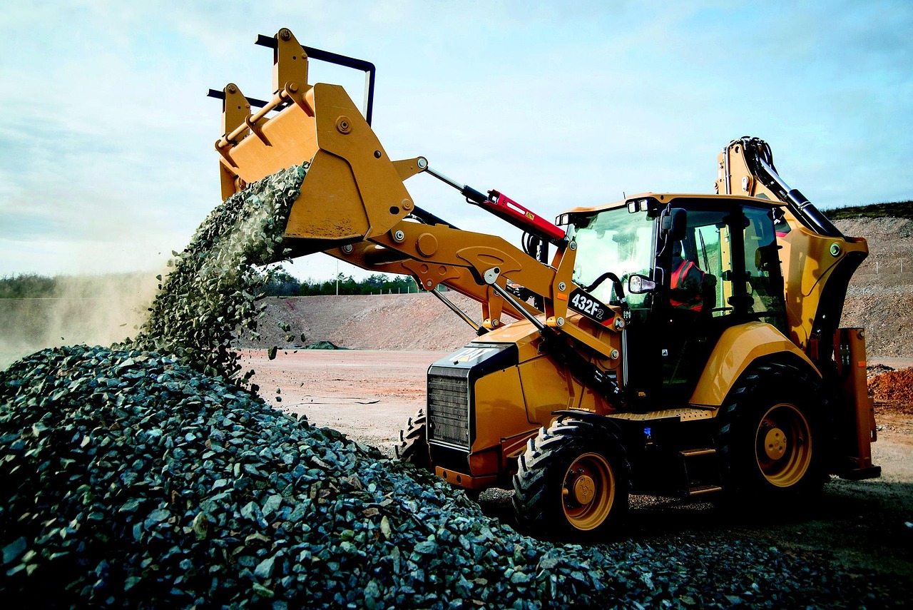 Koparko-ładowarka JCB 3CX podczas pracy